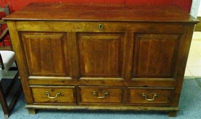 Lot 1150 - An 18th Century Joined Oak and Mahogany Crossbanded Hinged Chest, with three fielded panels...