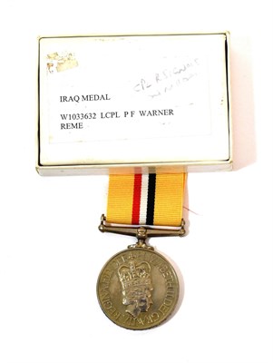 Lot 7 - An Iraq Medal, 2004, awarded to W1033632 CPL P F WARNER R SIGNALS, in box of issue
