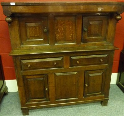 Lot 1160 - A Joined Oak Press Cupboard, circa 1700, with inverted turned finials above two fielded panel...