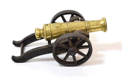 Lot 58 - A 19th Century Signal Cannon, the 22cm ringed brass barrel with flared muzzle, a large seal...