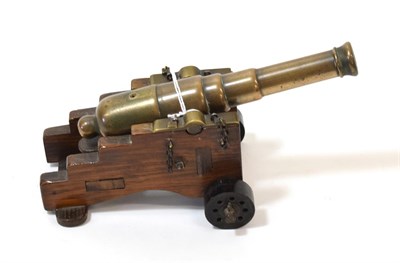 Lot 60 - A 19th Century Small Desk Signal Cannon, the 18cm four stage brass barrel with rounded cascabel and