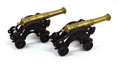 Lot 62 - A Matched Pair of Signal Cannon, each with 32cm ringed brass barrel with cylindrical trunnions...