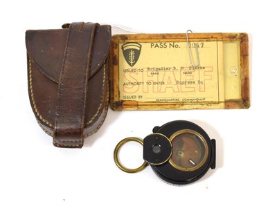 Lot 75 - A First World War Liquid Filled Black Enamelled Brass Pocket Compass by Aitchison, London, the...