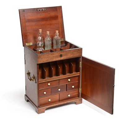 Lot 77 - An Edwardian Mahogany Small Campaign/Apothecary's Cabinet, of vertical rectangular form, the hinged