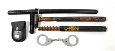 Lot 92 - A Victorian Ebonised Walnut Police Truncheon, the body painted with a crown over the Royal Coat...