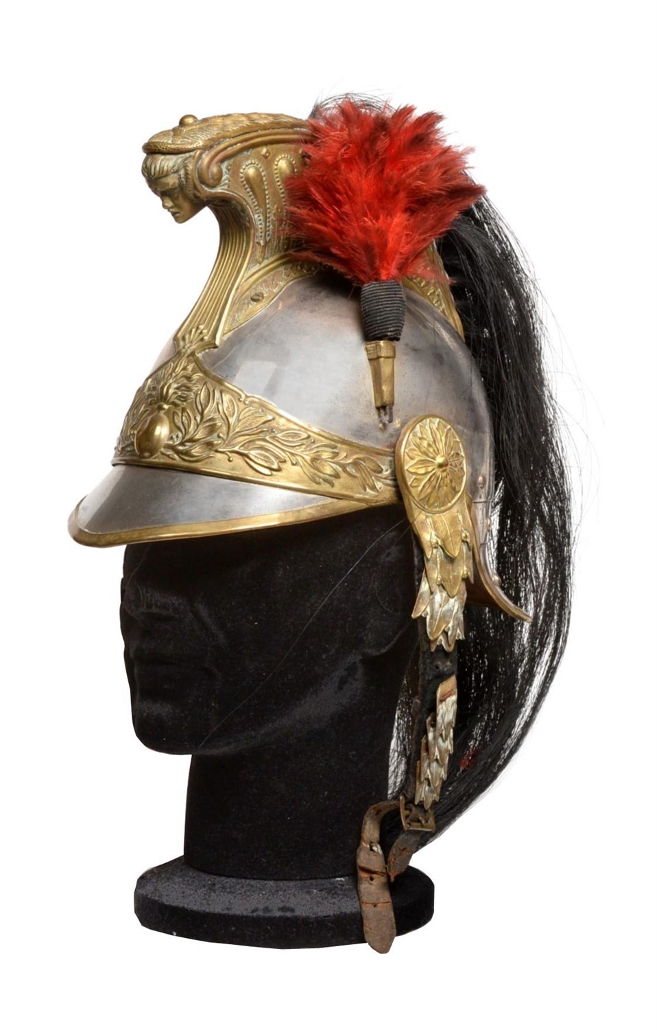 Lot 97 - A French Model 1874 Cuirassier Helmet, with steel skull, the brass comb embossed with beaded...