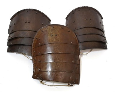 Lot 106 - A Pair of Tassets in the Late 16th Century Italian Style, each of four graduated brown...