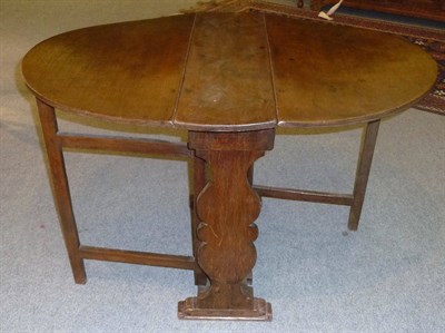 Lot 1170 - A Late 17th Century Joined Oak Gateleg Table, with two hinged drop leaves, pivoting gatelegs raised