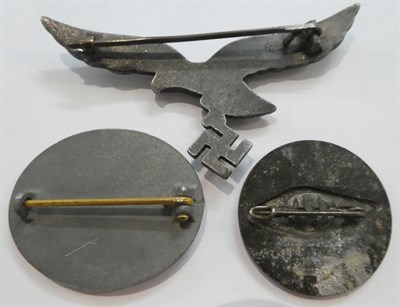 Lot 121 - A German Third Reich Luftwaffe Parachutist Badge, the reverse with vertical needle pin and...