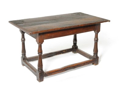 Lot 1171 - A Late 17th Century Joined Oak Refectory Dining Table, the rectangular plank top with later cleated