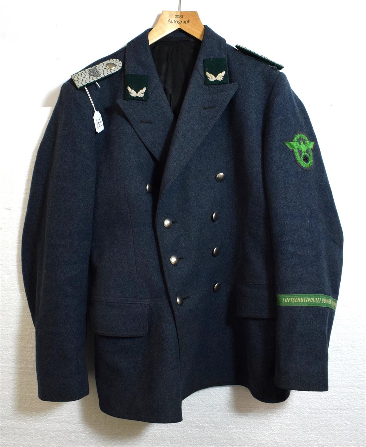 Lot 124 - A German Third Reich Luftschutzpolizei Tunic, in blue grey wool, double breasted with plain...