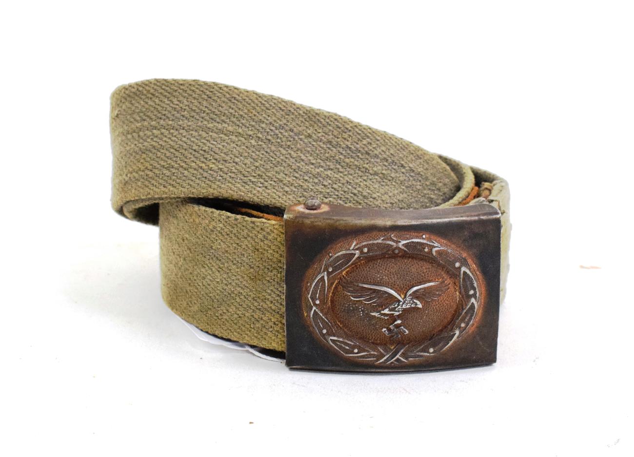 Lot 126 - A German Third Reich Luftwaffe Afrika Korps Belt Buckle, of stamped steel with browned finish,...