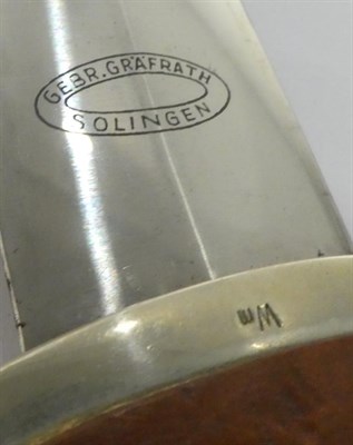 Lot 141 - A German Third Reich SA Dagger, the blade etched, ''Alles für Deutschland'', with maker's logo for