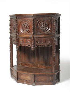 Lot 1173 - A 16th Century Joined Oak Credence Cupboard, the upper section with two hinged cupboard doors...