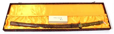 Lot 154 - A Japanese Second World War Katana, the 63.5cm steel blade one piece brass habaki,...