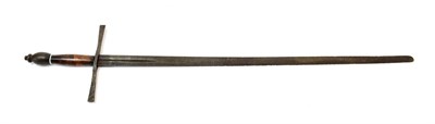 Lot 192 - A 19th Century Sword in the Medieval Style, the 87cm double edge steel blade with rounded tip...