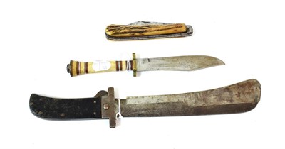 Lot 196 - A Second World War American Folding Machete by Cattaraugus, the 25cm steel blade with rounded...