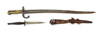 Lot 203 - A Fairbairn Sykes F.S.Fighting Knife, 2nd Pattern by Wilkinson Sword Ltd., London, the 15.5cm...