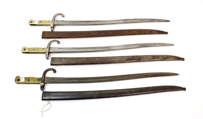 Lot 206 - Three French Model 1866 Chassepot Yataghan Sword Bayonets, each with T section steel blade, the...