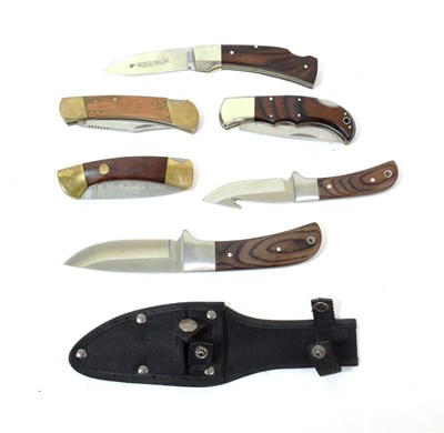 Lot 216 - A Brace of Modern 'Deerhunter' Hunting Knives, with wood grips, in a black nylon sheath; four...