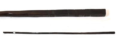 Lot 239 - A South Sea Islands Hardwood Long Staff, the square section head carved with bands of chevrons...