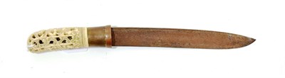 Lot 251 - A 19th Century Burmese Knife, the 21.5cm single edge steel blade with incised line and...