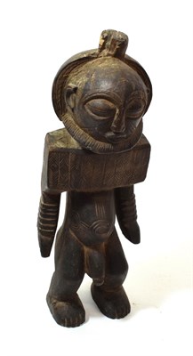 Lot 260 - A Mid 20th Century Hemba Ancestor Figure, DRC, as a standing man with beard, diaper incised...