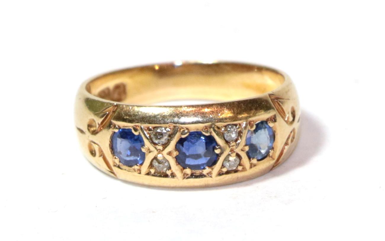 Lot 3 - An 18 carat gold sapphire and diamond ring, finger size H