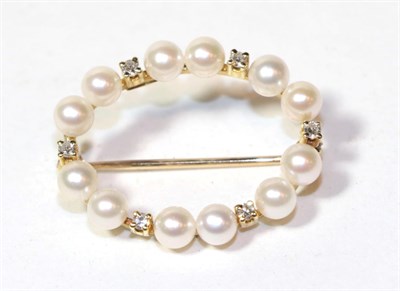 Lot 14 - A cultured pearl and diamond hoop brooch, stamped 'CB 750', length 2.6cm