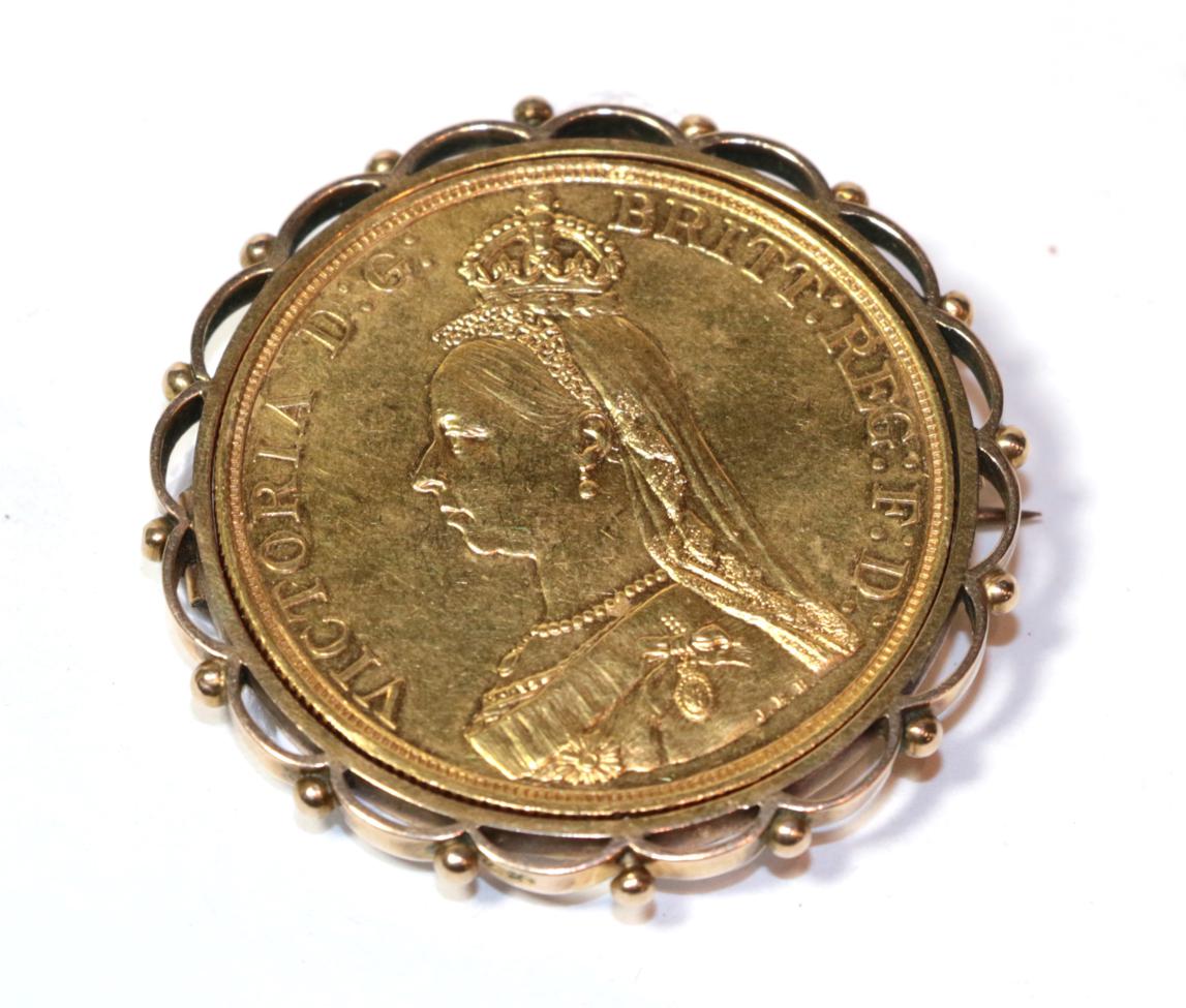 Lot 27 - A gold five pound coin mounted as a brooch, diameter 4.2cm
