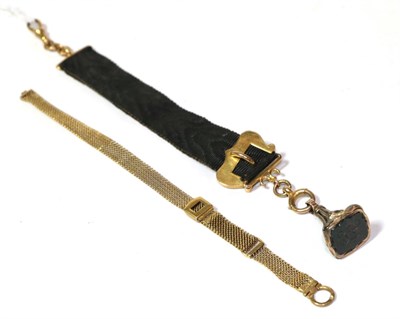 Lot 29 - A 9 carat gold watch chain and a 9 carat gold buckle Albert and unmarked fob