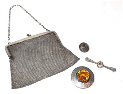 Lot 33 - A silver mesh purse, a kilt pin, an Iona silver brooch, and a further kilt pin stamped 'silver' (4)