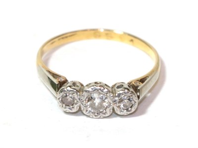 Lot 40 - A diamond three stone ring, finger size O