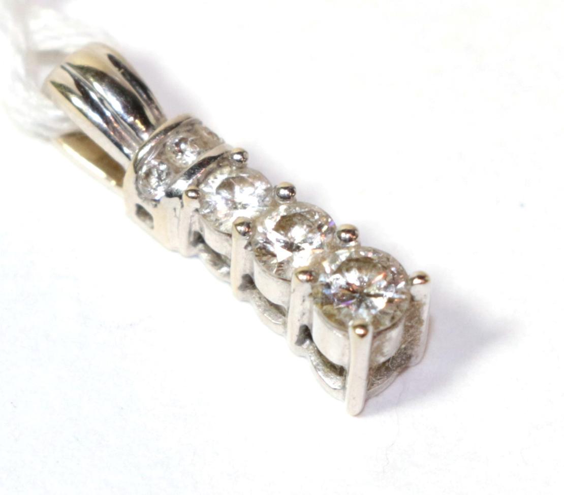 Lot 45 - A diamond set pendant, stamped '750', length 1.7cm