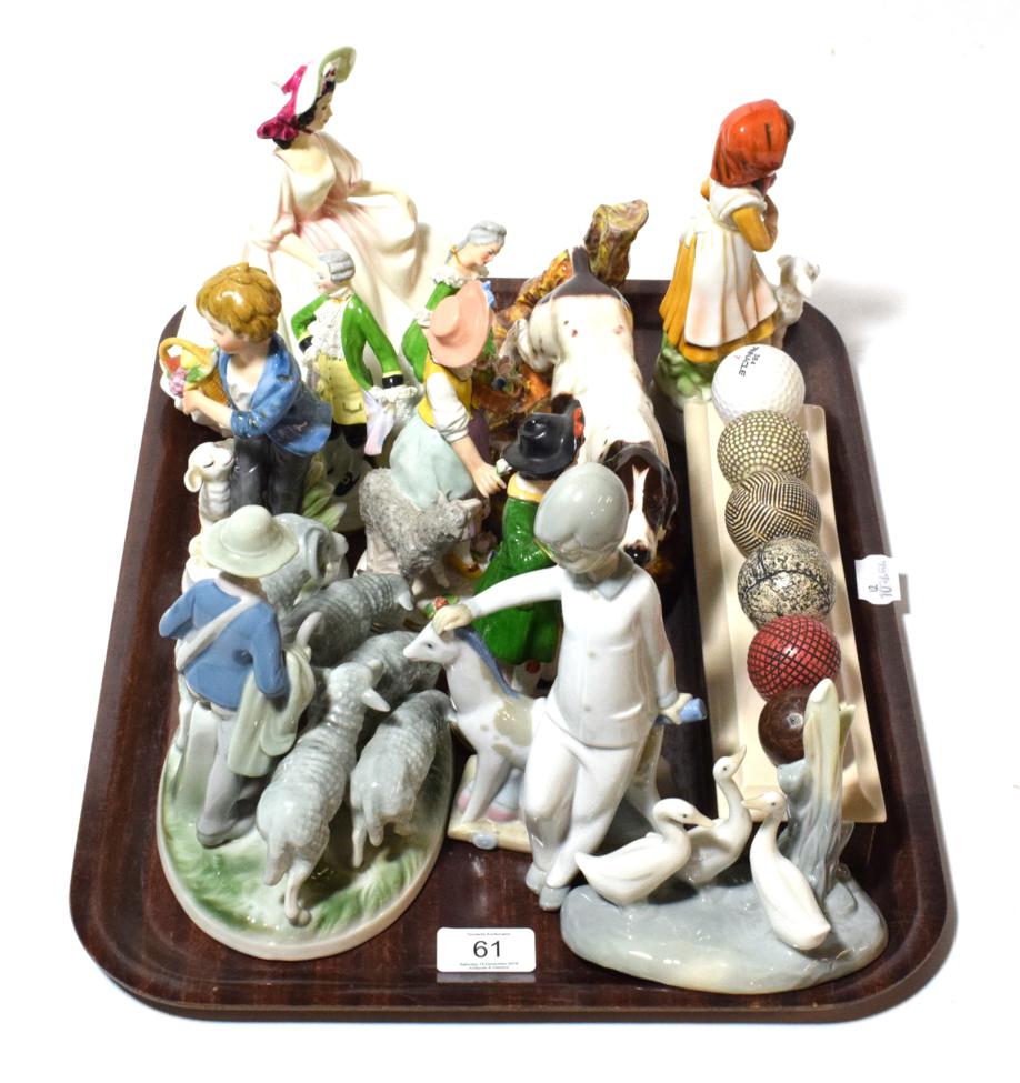 Lot 61 - A collection of ceramic models and figures to include Royal Doulton Sunday Best figure,...