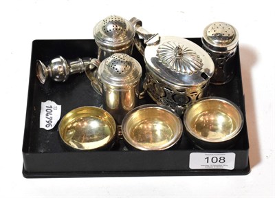 Lot 108 - A collection of silver condiment items, including: a pair of Victorian pepperettes, by Horace...