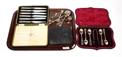 Lot 118 - A collection of silver flatware, including: a paper knife applied with the arms of the...