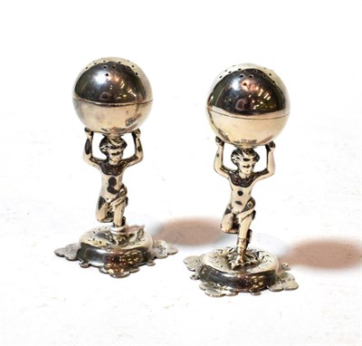 Lot 121 - A pair of Victorian silver pepperettes, by Jehoiada Alsop Rhodes, Sheffield, 1877, each in the form