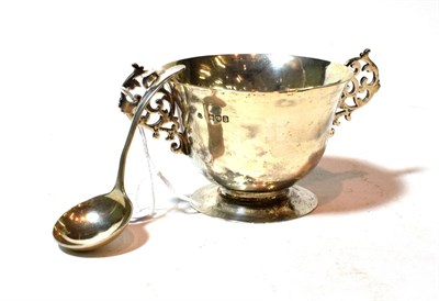 Lot 123 - A Victorian silver sugar-bowl and a George VI silver sauce-ladle, the bowl by Wakely and...
