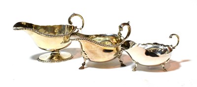 Lot 132 - Three Victorian and later sauceboats, one by George Unite, Birmingham, 1897, one by Thomas Bradbury