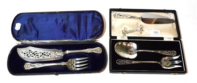 Lot 145 - A cased pair of Victorian silver fish-servers, by Henry John Lias and Henry John Lias, London,...