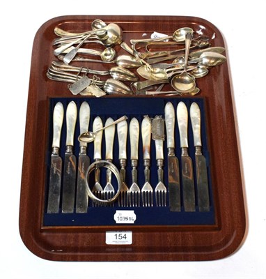 Lot 154 - A group of silver flatware, including: six pairs of Victorian silver-mounted mother-of-pearl...
