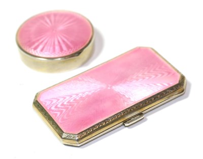 Lot 182 - A pink enamelled silver compact stamped with London import mark and 925; and a pink enamel...