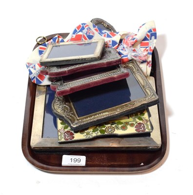 Lot 199 - Six silver and silver-plated photo frames, enamel frame, alarm clock, barometer, miniature and...