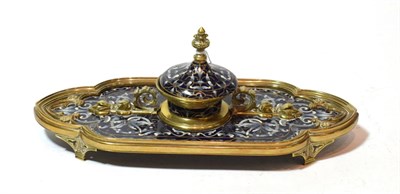 Lot 222 - A late 19th century brass and enamelled inkwell of lancet Gothic Revival design, 28cm width
