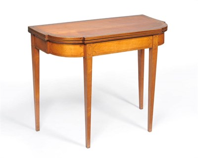 Lot 1216 - A George III Satinwood, Ebony Strung and Zebrawood Banded Card Table, circa 1800, of breakfront...