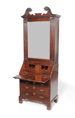 Lot 1217 - A George II Small Mahogany Bureau Bookcase, mid 18th century, the swan neck pediment above a...