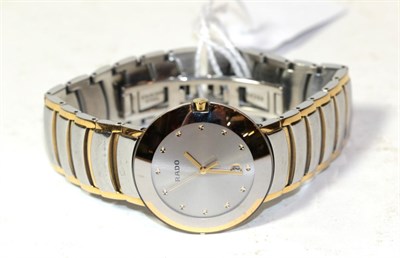 Lot 250 - A bi-metal calendar centre seconds wristwatch, signed Rado, model Diastar, quartz movement and...