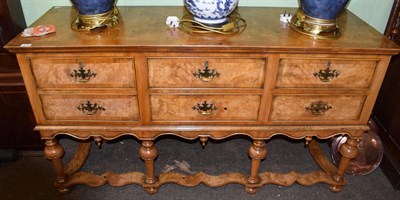 Lot 418 - A reproduction walnut and crossbanded sideboard in the William & Mary style, 154cm wide