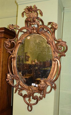 Lot 431 - A Victorian gilt and gesso two-branch girandole mirror, 112cm high